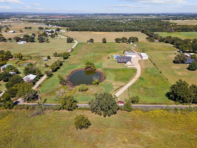 bird's eye view with a water view and a rural view