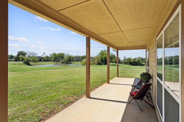view of patio featuring a water view