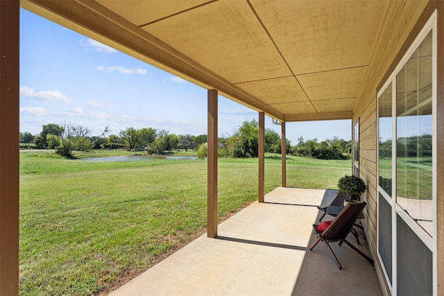 view of patio / terrace with a water view