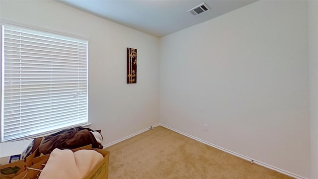 sitting room with light carpet