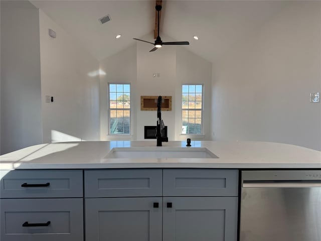 kitchen with ceiling fan, sink, high vaulted ceiling, stainless steel dishwasher, and gray cabinets