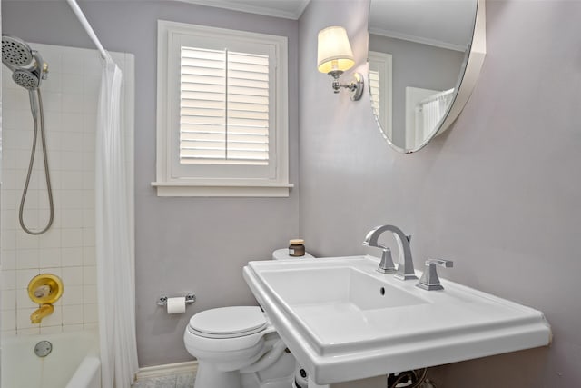 full bathroom featuring shower / bath combo, crown molding, toilet, and sink