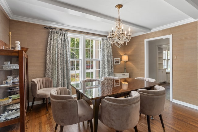 dining space with a notable chandelier, crown molding, and dark hardwood / wood-style flooring