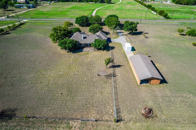 birds eye view of property featuring a rural view