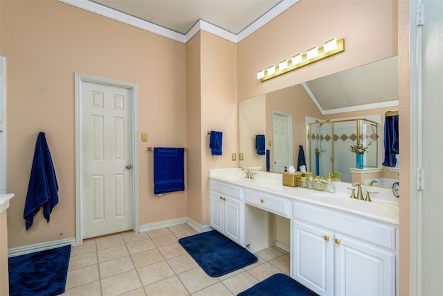 bathroom with ornamental molding, tile patterned floors, a shower with door, and vanity