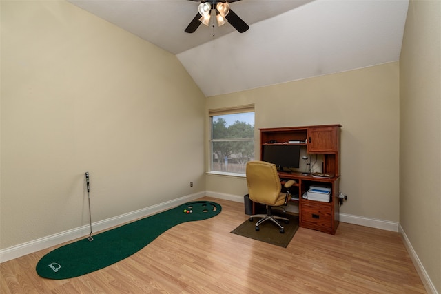 office space with light wood-type flooring, vaulted ceiling, and ceiling fan