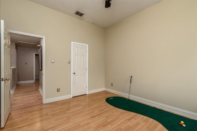 interior space featuring light wood-type flooring and ceiling fan