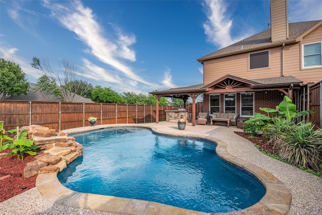 view of swimming pool with a patio