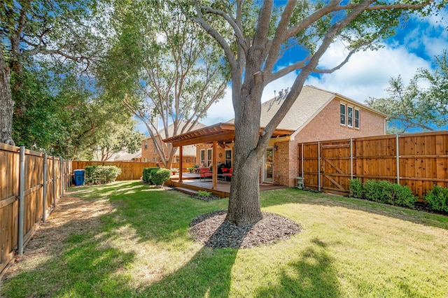 view of yard featuring a wooden deck