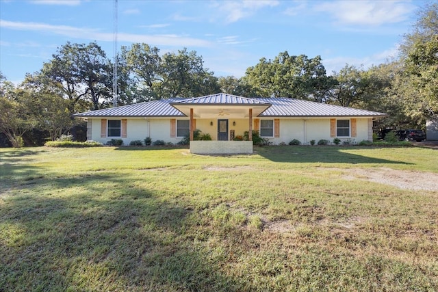 single story home with a front lawn