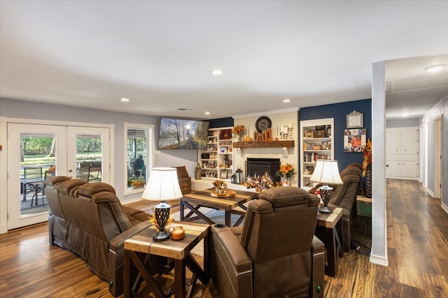 living room featuring dark hardwood / wood-style floors and french doors