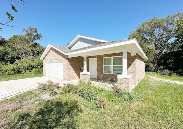 view of front facade with a front lawn and a garage