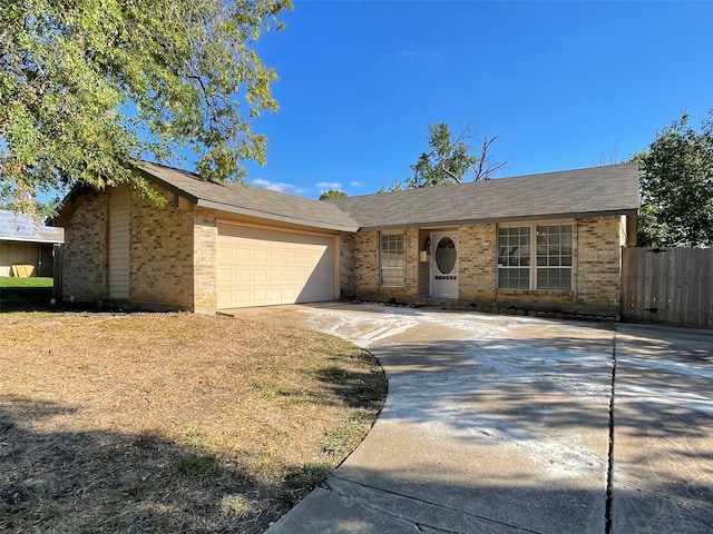 single story home featuring a garage