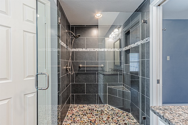 bathroom with vanity and walk in shower