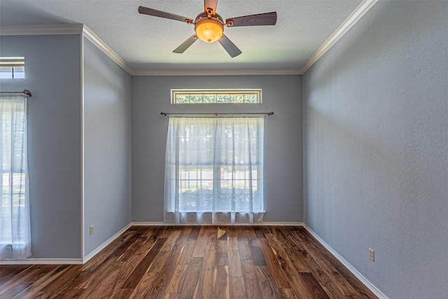 spare room featuring ceiling fan, ornamental molding, and dark hardwood / wood-style flooring