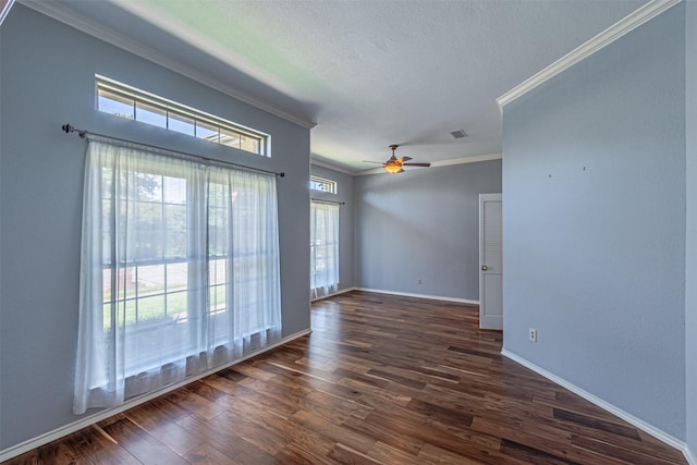 empty room with dark hardwood / wood-style flooring, crown molding, a textured ceiling, and ceiling fan