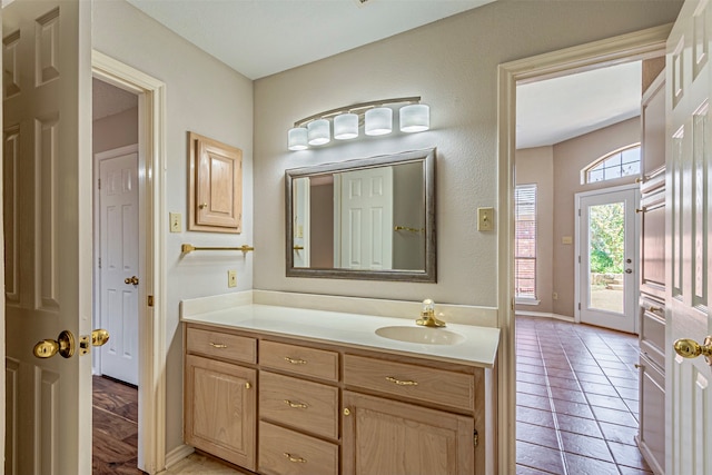 bathroom with vanity and tile patterned floors