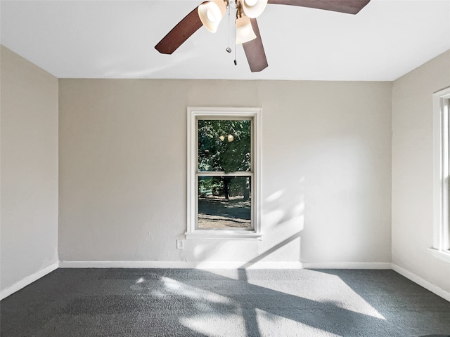 unfurnished room featuring carpet and ceiling fan