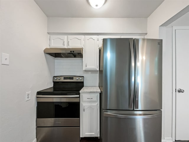 kitchen with decorative backsplash, white cabinetry, and appliances with stainless steel finishes