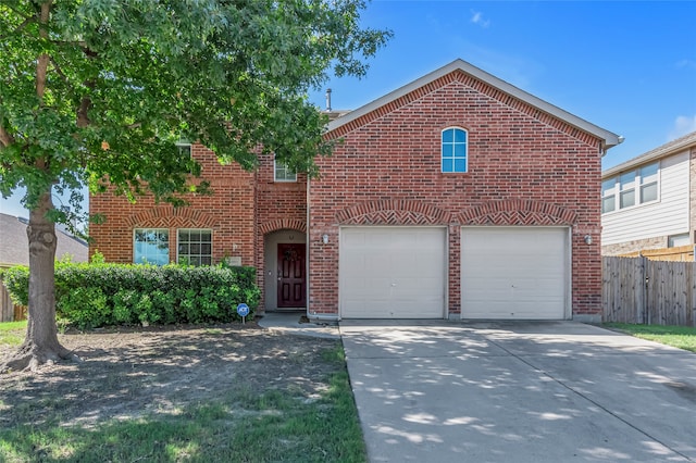 6001 Red Drum Dr, Fort Worth, TX 76179 - traditional home with driveway, brick siding, and a garage