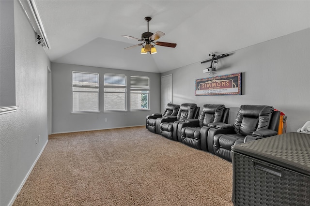 6001 Red Drum Dr, Fort Worth, TX 76179 - cinema featuring ceiling fan, vaulted ceiling, carpet floors, baseboards, and a textured wall