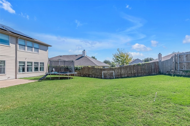 6001 Red Drum Dr, Fort Worth, TX 76179 - view of yard with a trampoline and a patio area
