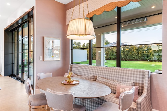 dining area featuring wood-type flooring and breakfast area