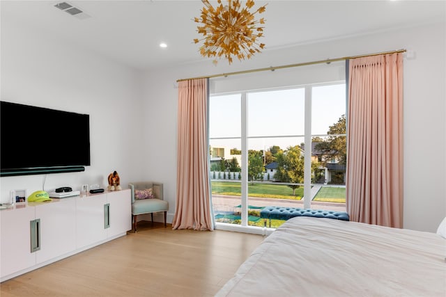 bedroom featuring light hardwood / wood-style floors