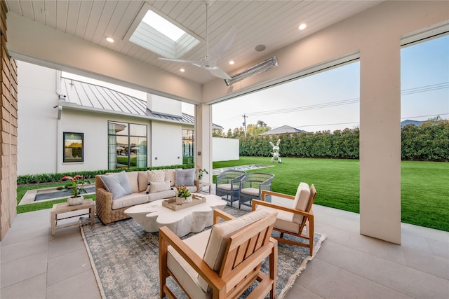 view of patio / terrace with an outdoor hangout area and ceiling fan