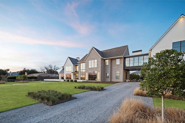 view of front of home with a front yard