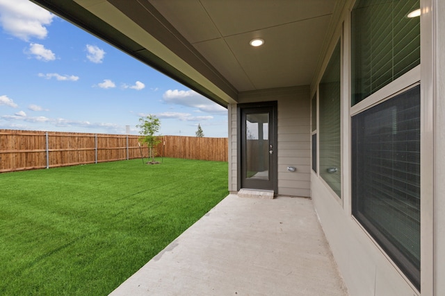 view of yard with a patio and a fenced backyard