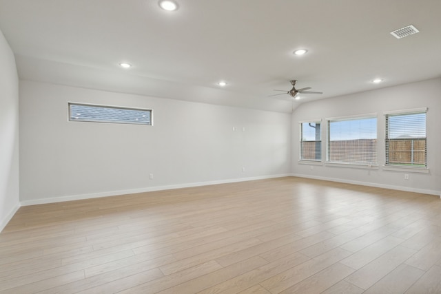 unfurnished room with visible vents, baseboards, recessed lighting, light wood finished floors, and a ceiling fan