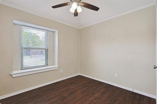 unfurnished room featuring ornamental molding, ceiling fan, and dark hardwood / wood-style floors