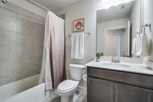 full bathroom with shower / bath combo, vanity, and toilet