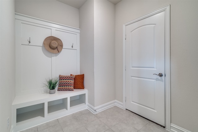 mudroom featuring light tile patterned flooring