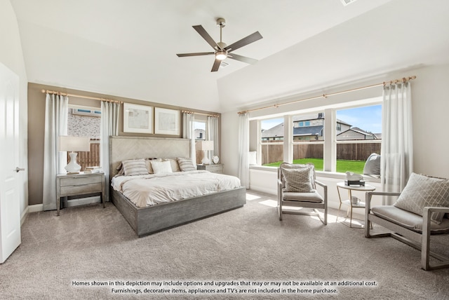 carpeted bedroom featuring ceiling fan and lofted ceiling