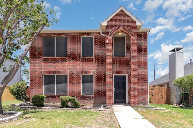 view of front facade featuring a front yard