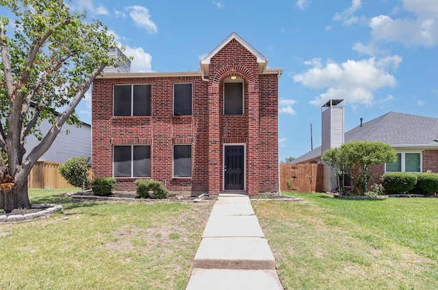 view of front of home with a front lawn