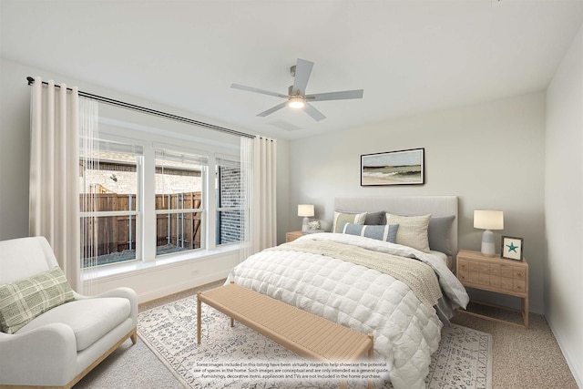 bedroom featuring ceiling fan and light colored carpet