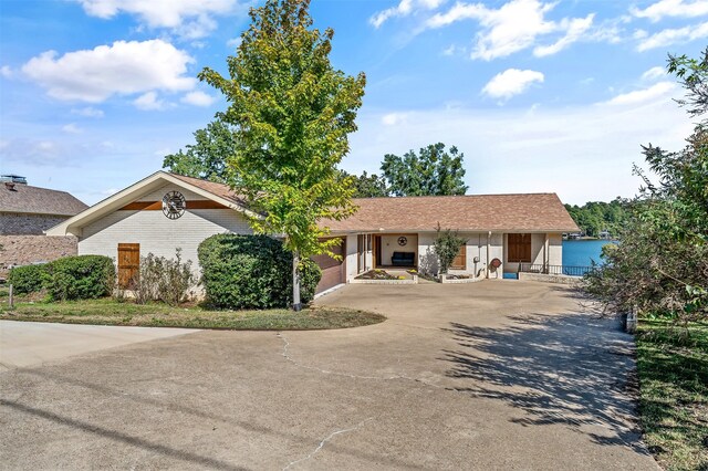 ranch-style house featuring a garage