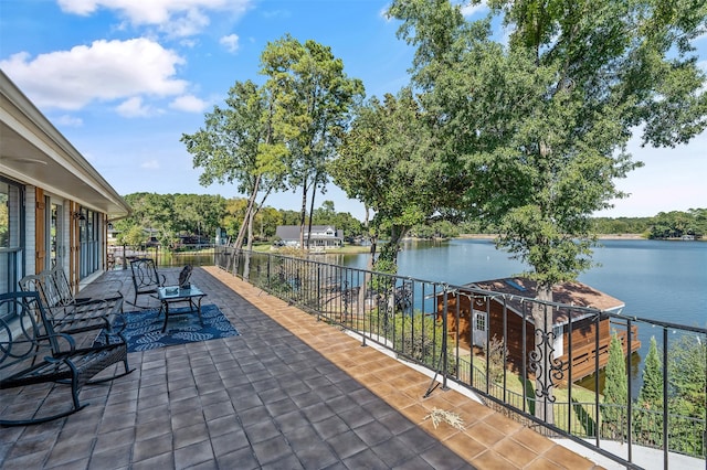 view of patio / terrace featuring a water view