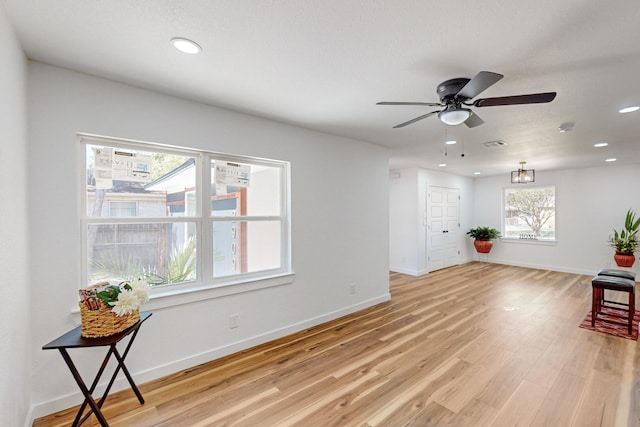 2909 Materhorn Dr, Dallas, TX 75228 - living area featuring ceiling fan, light wood-style floors, and recessed lighting