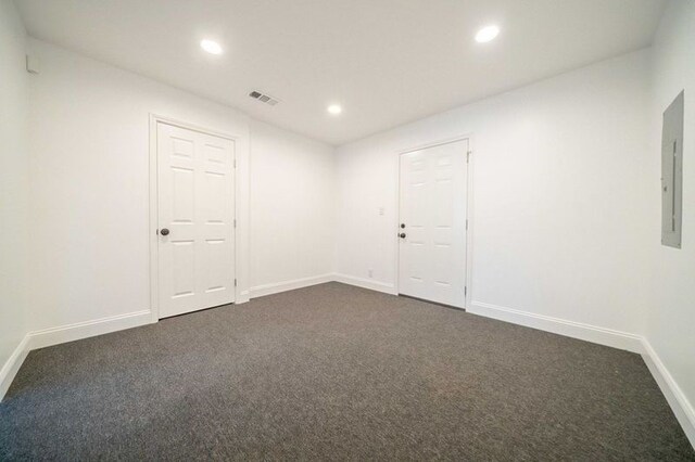 4944 Vega Ct W, Fort Worth, TX 76133 - unfurnished room with dark carpet, recessed lighting, baseboards, and electric panel