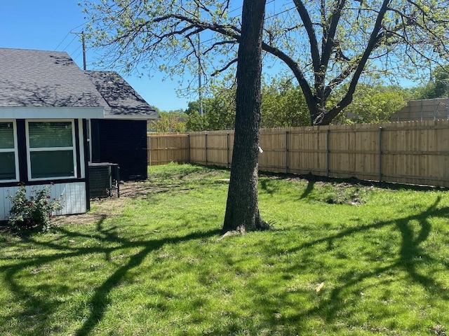 view of yard with central AC unit