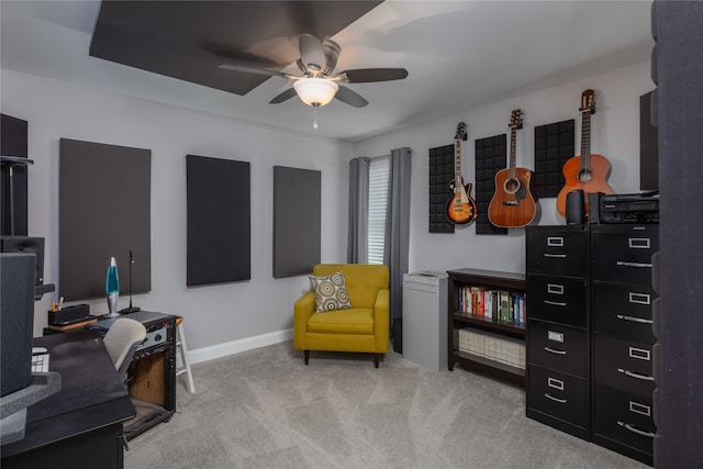 office area with light carpet and ceiling fan