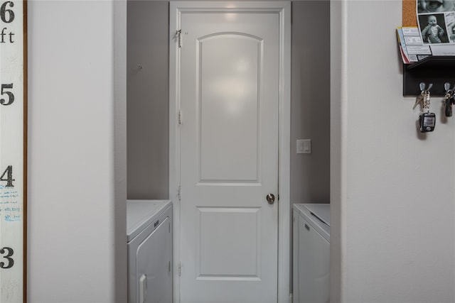 laundry area featuring independent washer and dryer