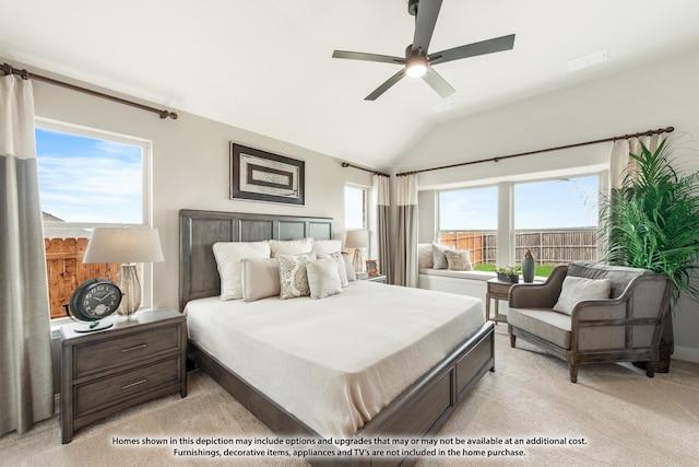 carpeted bedroom with multiple windows, lofted ceiling, and ceiling fan