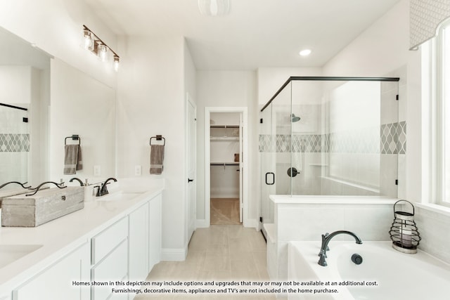 bathroom featuring vanity, shower with separate bathtub, and tile patterned floors