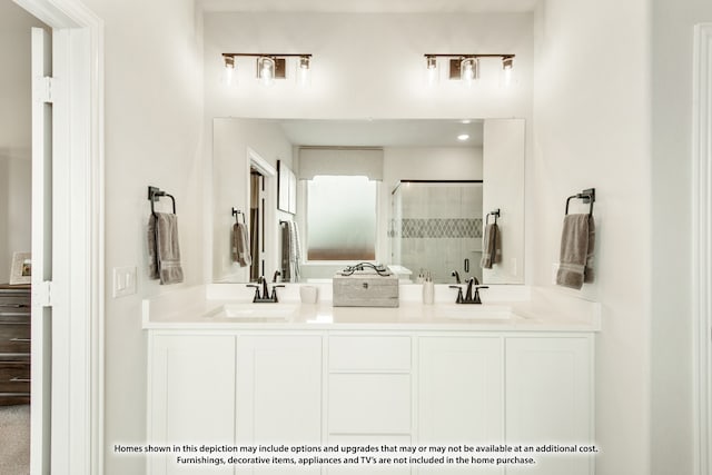 bathroom with vanity and an enclosed shower