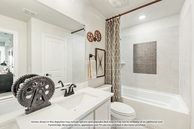 full bathroom with vanity, toilet, and shower / bath combo with shower curtain